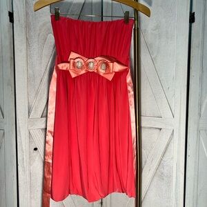Elegant Red Strapless Dress with Bow